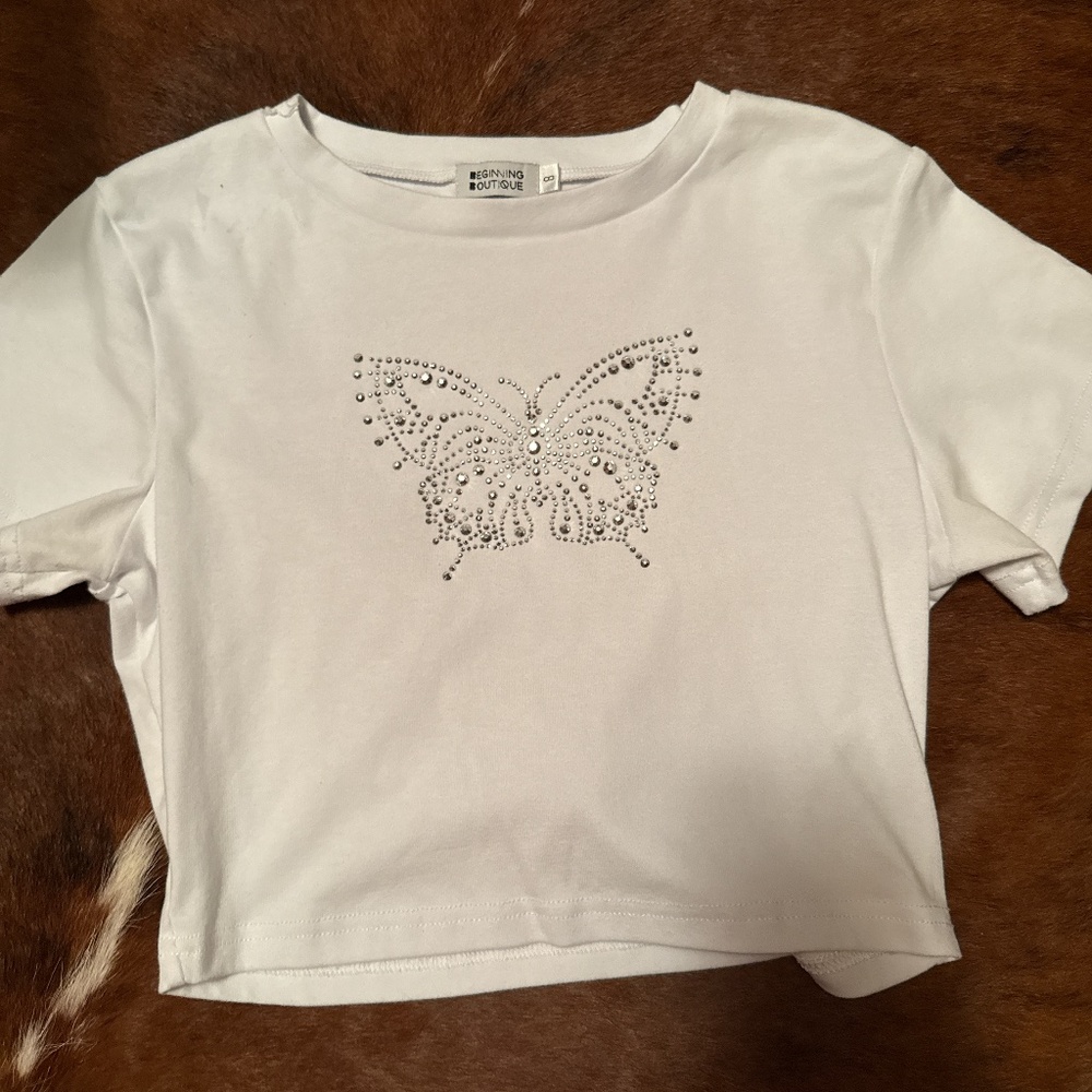 Beginning boutique women’s graphic top